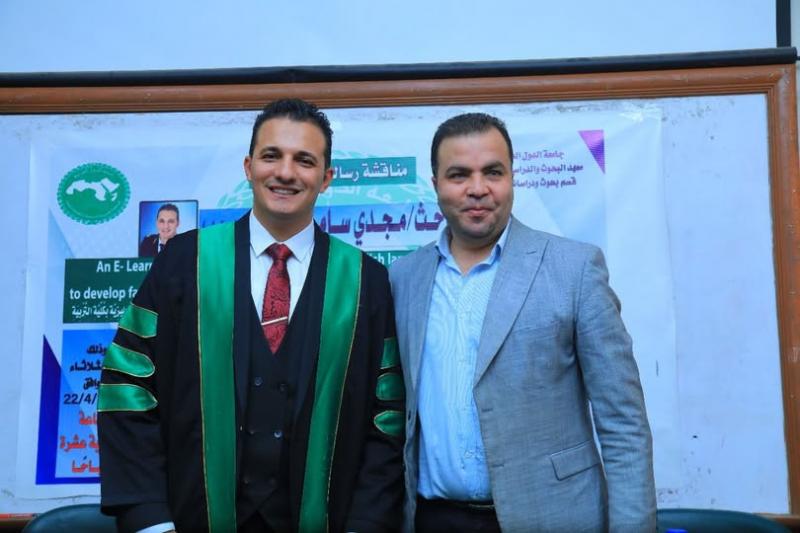 الرائد مجدي حبيب والصحفي محمد الإشعابي 