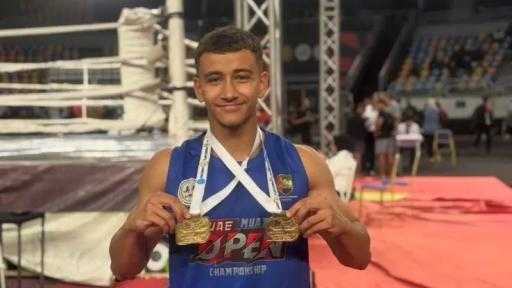 طالب بالجامعة الأمريكية يُتوج بجائزة المركز الأول في بطولة كأس أفريقيا لـ«الكيك بوكسينج»