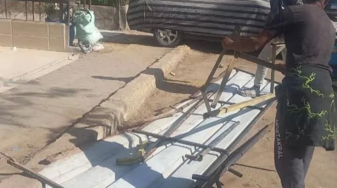 حملة لإزالة الحواجز الحديدية والتعديات على شارع الفيوم بحي دار السلام القاهرة