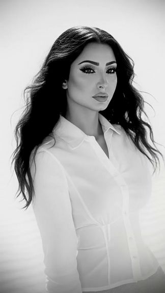 الكاتبة والمحررة الإعلامية الدكتورة دينا المصري 